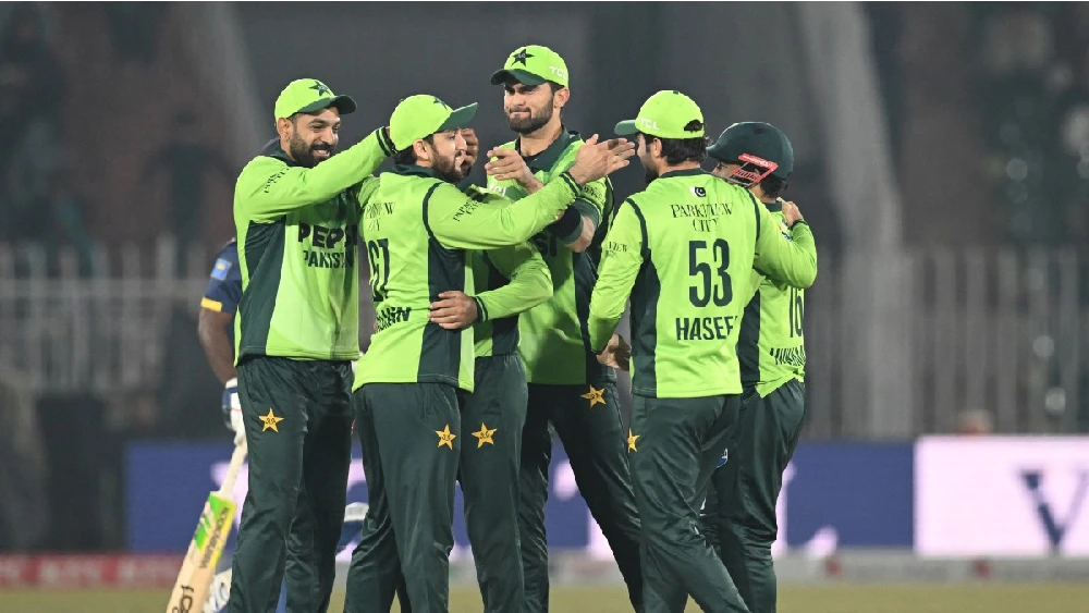 Pakistan's captain Shaheen Shah Afridi (C) celebrates with teammates after the dismissal of Sri Lanka's captain Charith Asalanka (not pictured) during the first one-day international (ODI) cricket match between Pakistan and Sri Lanka at the Rawalpindi Cri